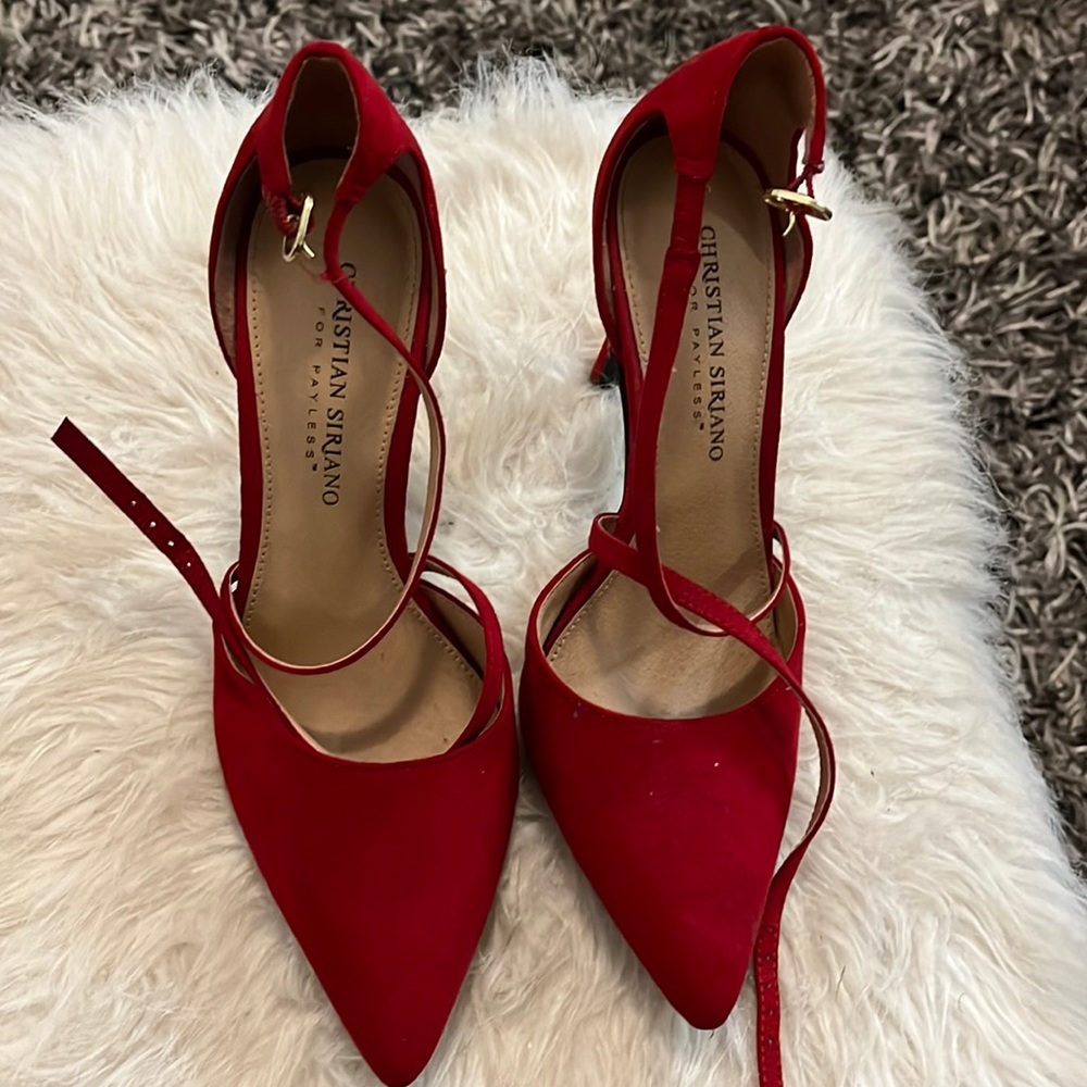 Cute red heel! Would add great accessory to your closet!